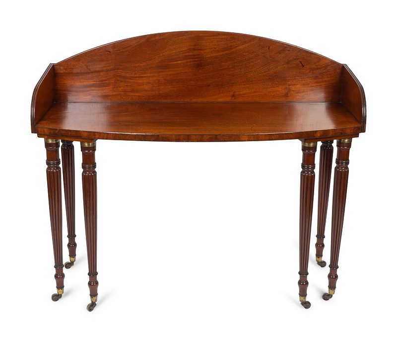 Appraisal: A Regency Mahogany Bow Front Dressing Table Height x width