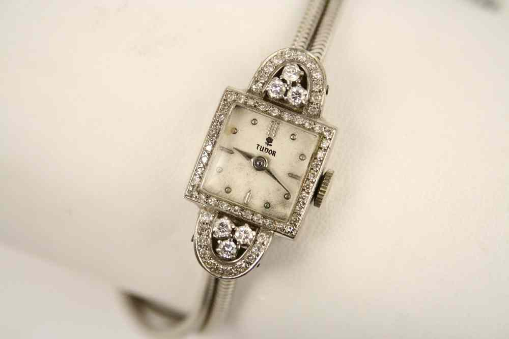 Appraisal: LADY'S WATCH - K White Gold and Diamond encrusted square