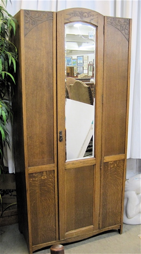 Appraisal: SINGLE-DOOR OAK WARDROBE English mid- th century with single mirror-paneled