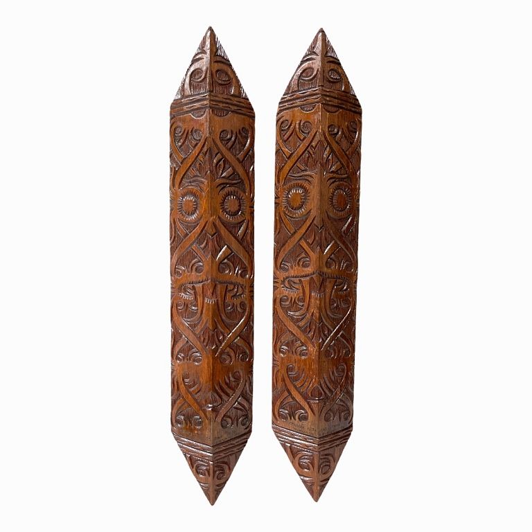 Appraisal: Pair of Indonesian Wood Shields Carved wood very good condition