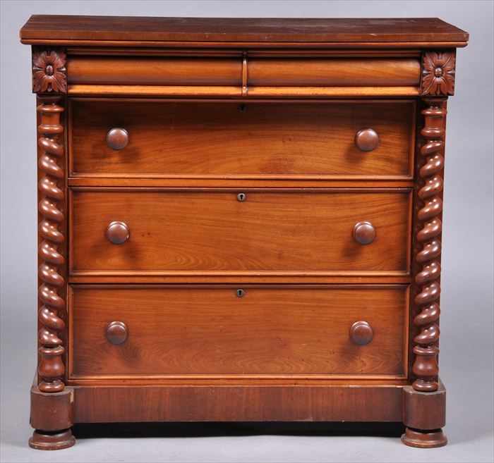 Appraisal: VICTORIAN MAHOGANY 'SCOTCH' CHEST OF DRAWERS The two-drawer overhanging frieze