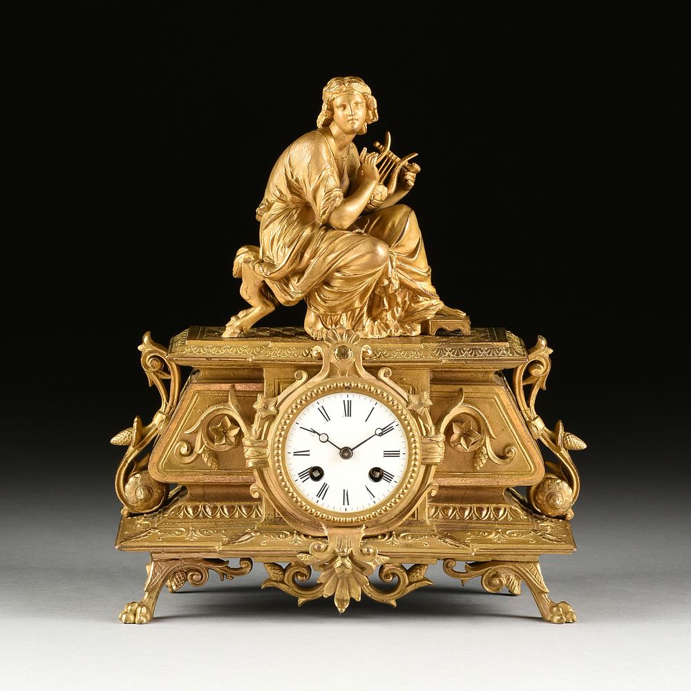 Appraisal: A NAPOLEON III NEO-GREC GILT METAL CLOCK Allegory of Poetry