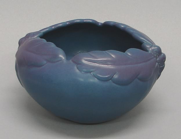 Appraisal: Molded acorns and oak leaves blue-purple matte glaze incised on