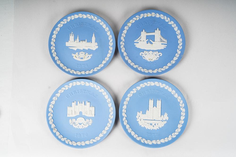 Appraisal: FOUR WEDGWOOD PLATESChristmas pattern Condition no apparent cracks or repairs