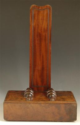 Appraisal: A George IV mahogany plate stand with a loaded base