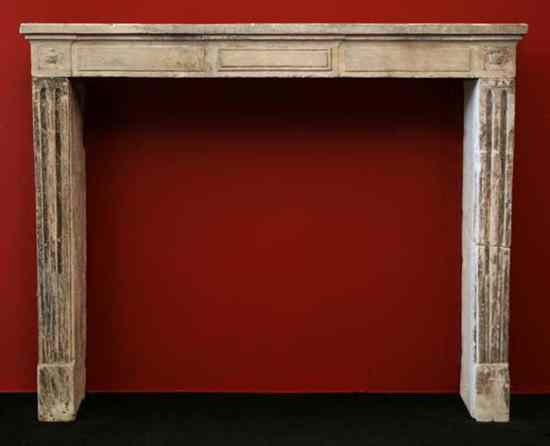 Appraisal: A French Louis XVI Limestone Fireplace Surround th century having