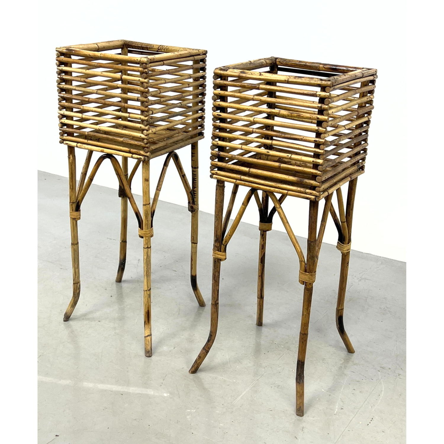 Appraisal: Pr Rattan Square Planters on Stands Stacked rattan dowels Dimensions