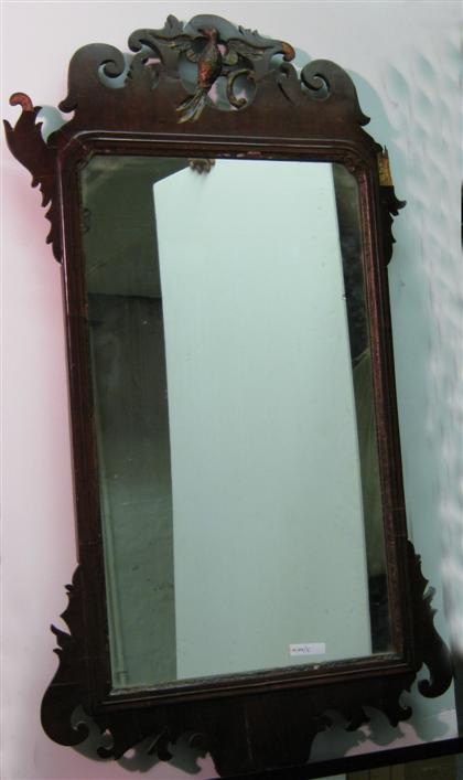 Appraisal: Chippendale style mirror with carved eagle decoration Veneer lose