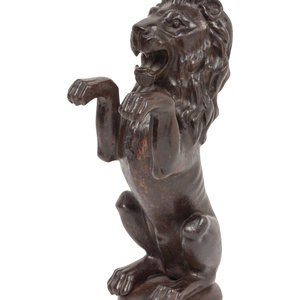 Appraisal: A Cast Iron Architectural Post of a Rampant Lion th