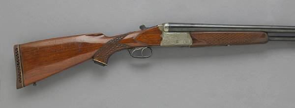 Appraisal: An Austrian gauge triple barrel boxlock shotgun by Gottfried Juch