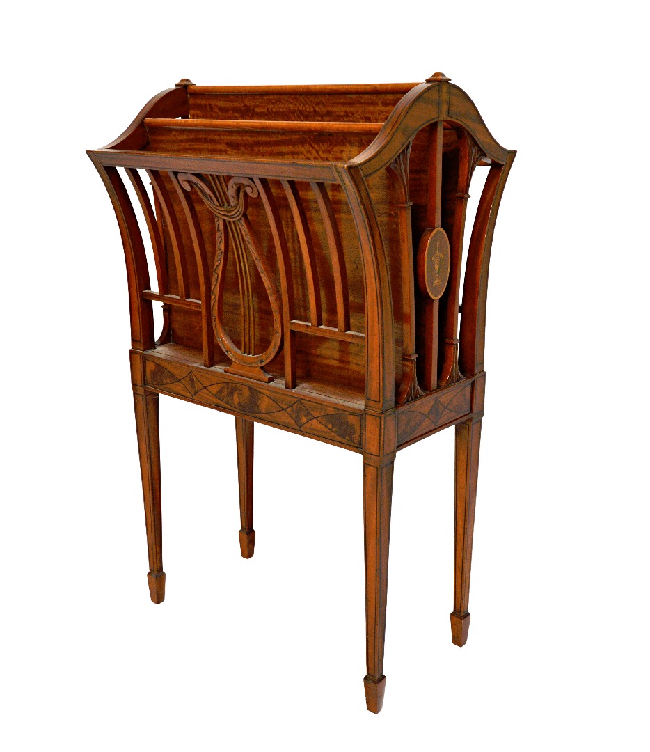 Appraisal: An Edwardian marquetry inlaid satinwood Canterbury the outswept four division