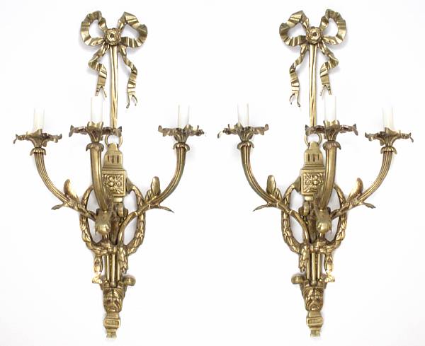 Appraisal: A pair of Louis XVI style gilt bronze three light