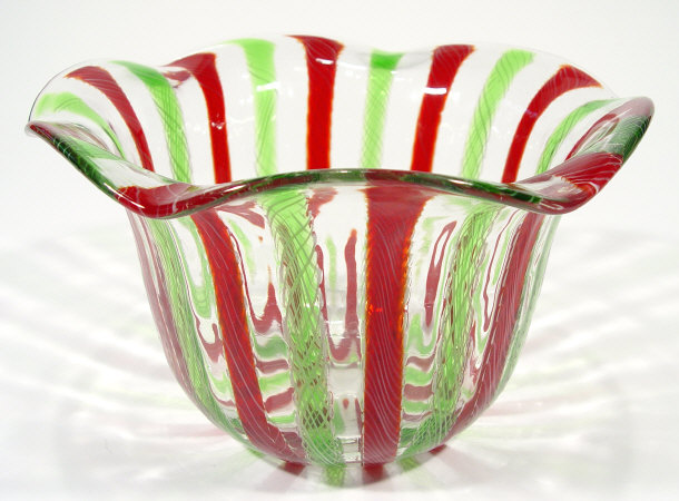 Appraisal: Large Italian glass bowl with green and red latticino striped