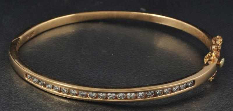 Appraisal: K Y Gold Diamond Hinged Bracelet Description With diamonds Condition