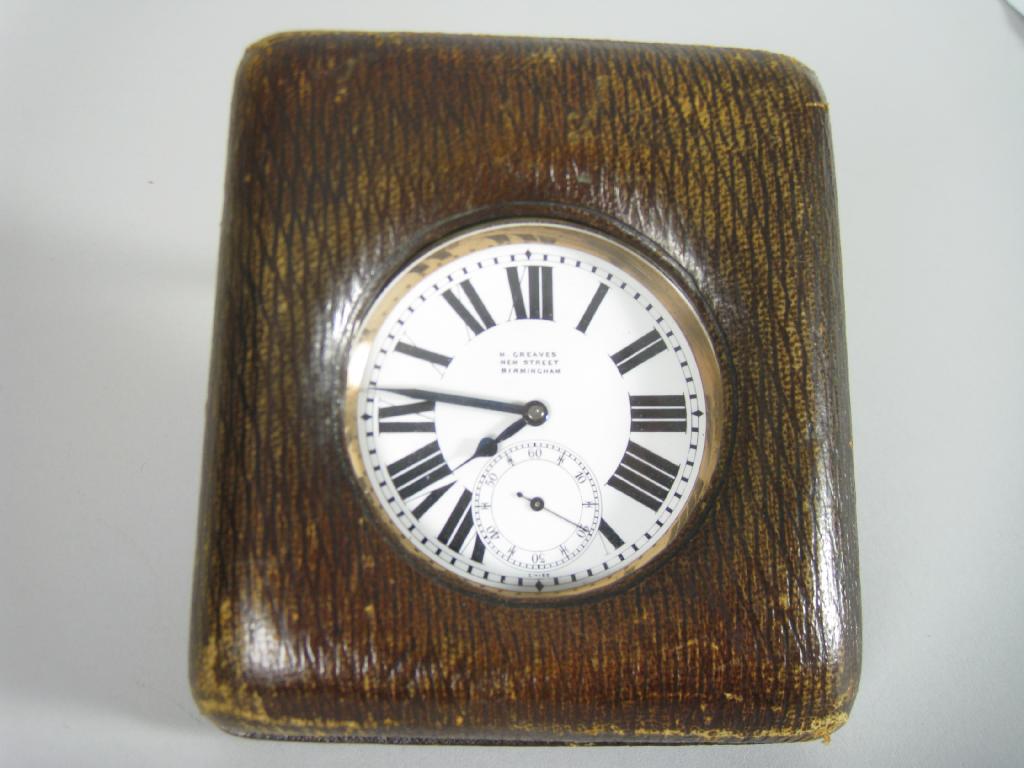 Appraisal: A silver plated cased Travelling Clock in form of a