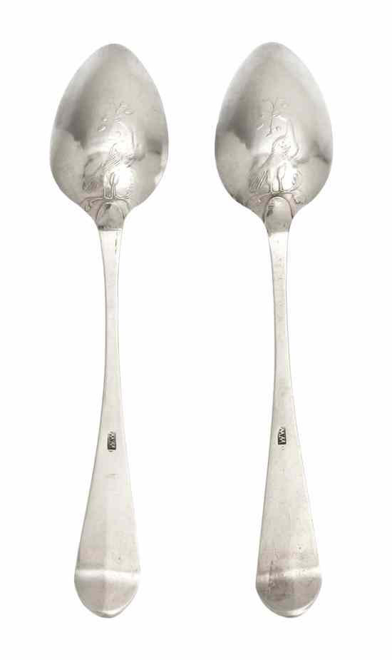 Appraisal: A Pair of American Coin Silver Spoons each bowl decorated