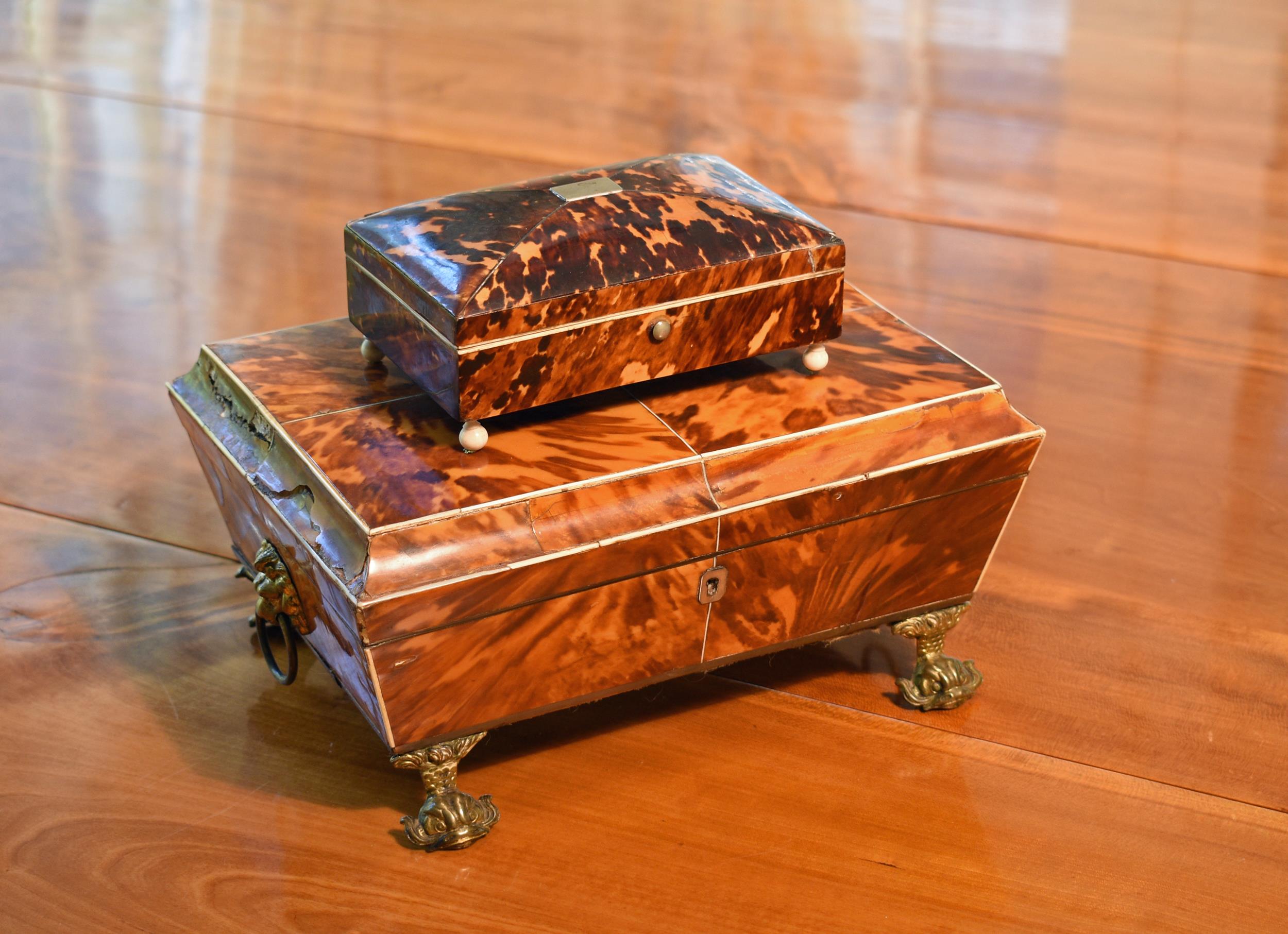 Appraisal: TWO TORTOISE SHELL DRESSER BOXES A larger tortoise shell box