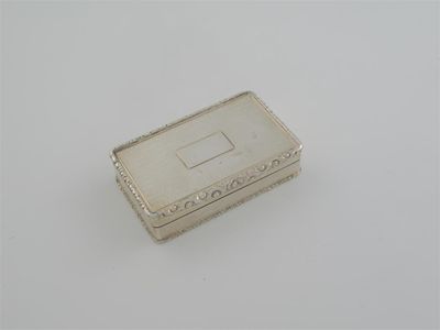 Appraisal: An early Victorian oblong snuff box with raised floral borders