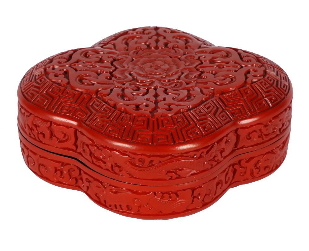 Appraisal: CHINESE CINNABAR COVERED BOXthe removable cover centered by a flower