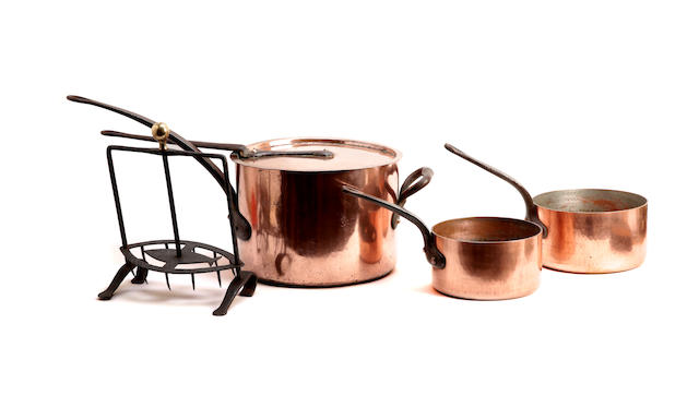 Appraisal: Three French graduated copper saucepans The largest with impressed cockerel