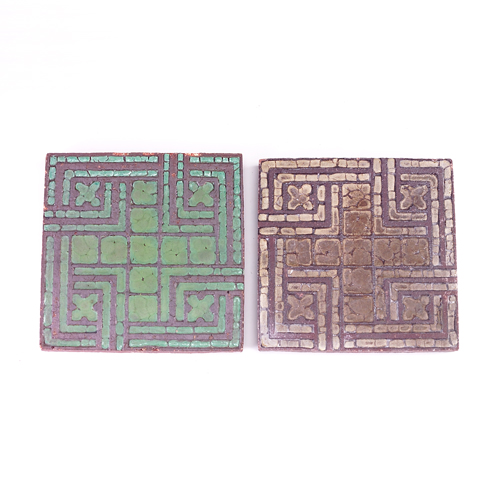 Appraisal: GRUEBY Two geometric floor tiles in cross pattern one in