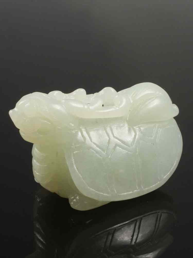 Appraisal: CHINESE JADE FIGURINE - th c carved celadon jade dragon