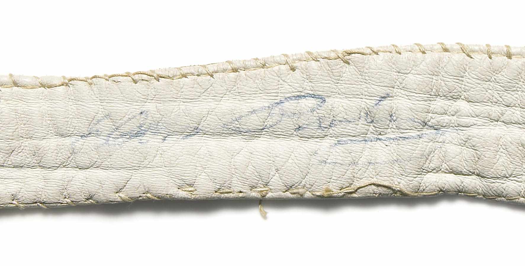 Appraisal: Elvis Presley signed belt A white leather belt sewn together