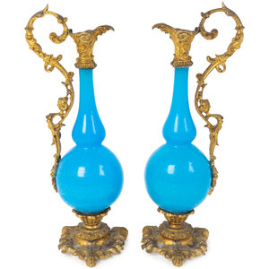 Appraisal: A Pair of Gilt Bronze Mounted Blue Opaline Glass Ewers