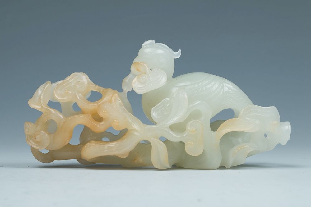 Appraisal: PHOENIX RUYI CARVING QING Depicting a carved phoenix holding Ganoderma