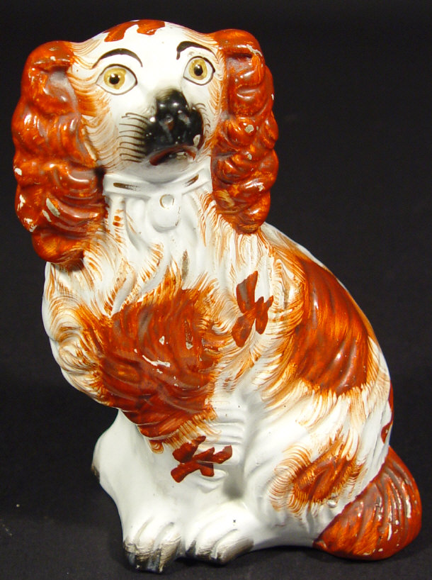 Appraisal: Victorian Staffordshire spaniel hand painted in brown with a gold