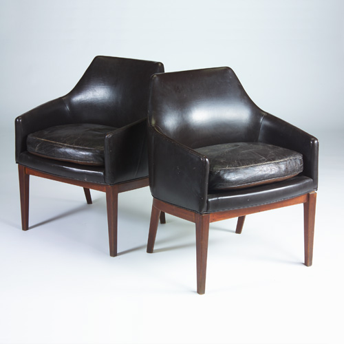 Appraisal: SCANDINAVIAN Pair of armchairs upholstered in dark brown leather on