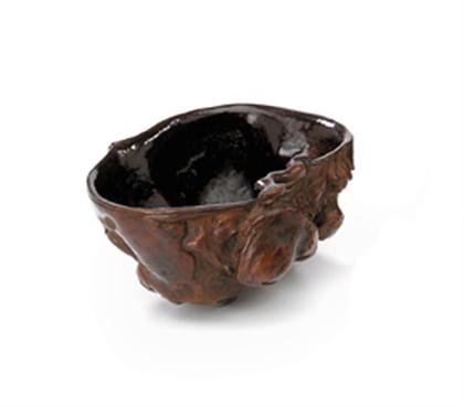 Appraisal: Chinese root wood cup th century Of shallow U-shape form