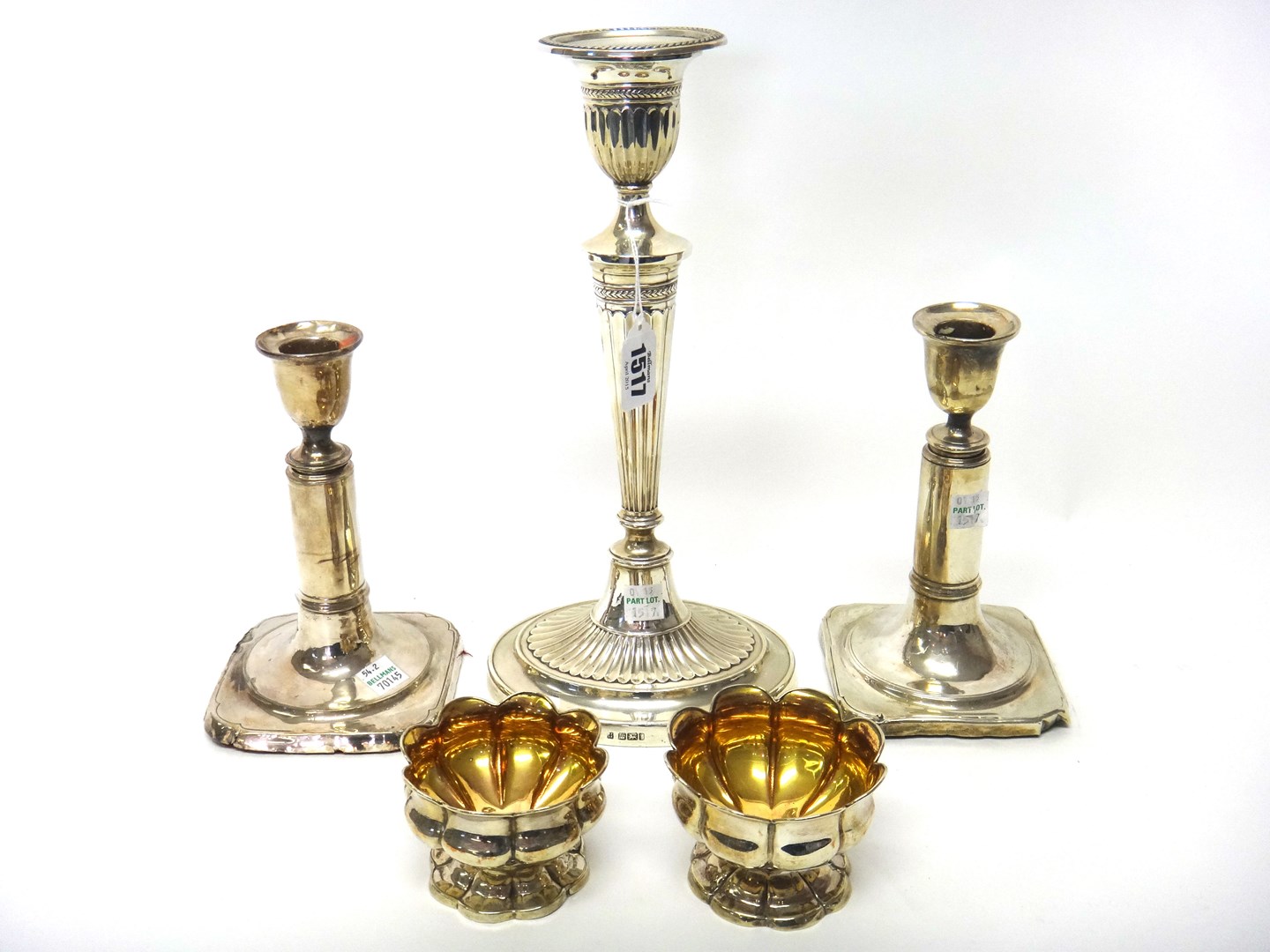 Appraisal: A silver table candlestick of Adam style with partly fluted