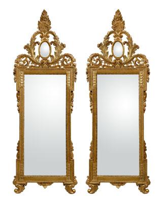 Appraisal: Pair Continental gilt wood mirrors leaf-carved and mirror-inset crests over