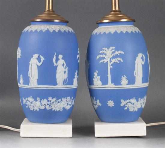 Appraisal: Pair of Wedgwood blue and white jasperware vases mounted as