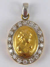 Appraisal: A yellow metal tests carat gold diamond pendant estimated total