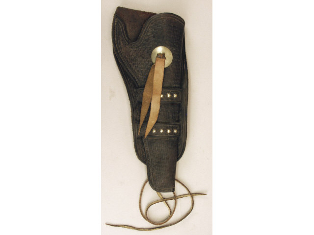 Appraisal: Good looking double loop holster with stamped design concho and