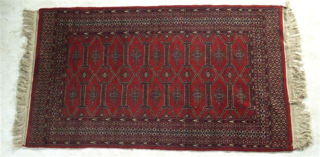 Appraisal: PERSIAN RUG with a dark red ground m by m