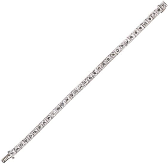 Appraisal: ART DECO DIAMOND PLATINUM LINE BRACELET fine transitional cut diamonds