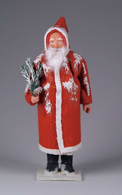 Appraisal: RED COAT SANTA CANDY CONTAINER This jolly fellow of recent