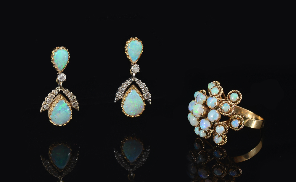 Appraisal: OPAL RING EARRINGS K yellow gold earrings and ring contain