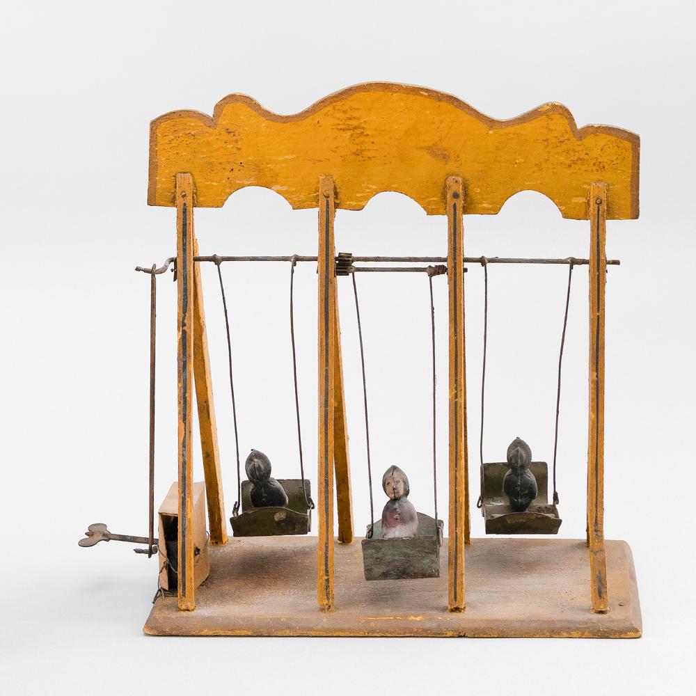 Appraisal: FRENCH TIN AND WOOD SWING TOY LATE TH CENTURY HEIGHT