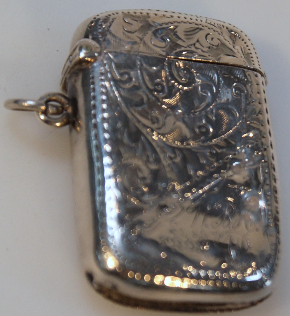 Appraisal: An Edwardian silver vesta case by Samuel Levi the shaped