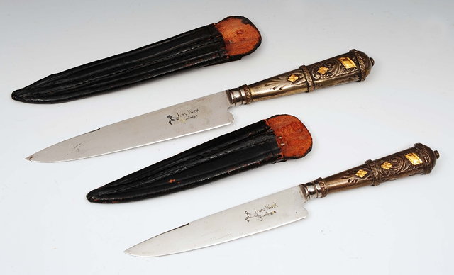 Appraisal: Two Franz Wenk Solingen kniveswith sheaths with inset yellow metal