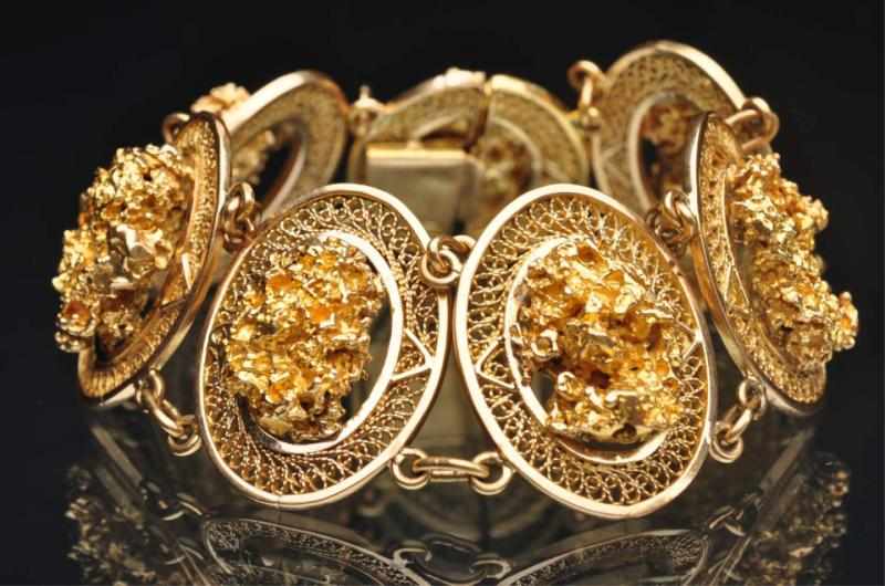 Appraisal: K Y Gold Nugget Bracelet Impressive with large nuggets Weight