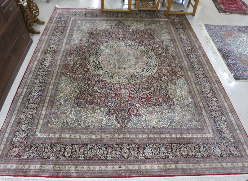 Appraisal: ORIENTAL HAND KNOTTED SILK CARPET Sino-Persian floral and central floral