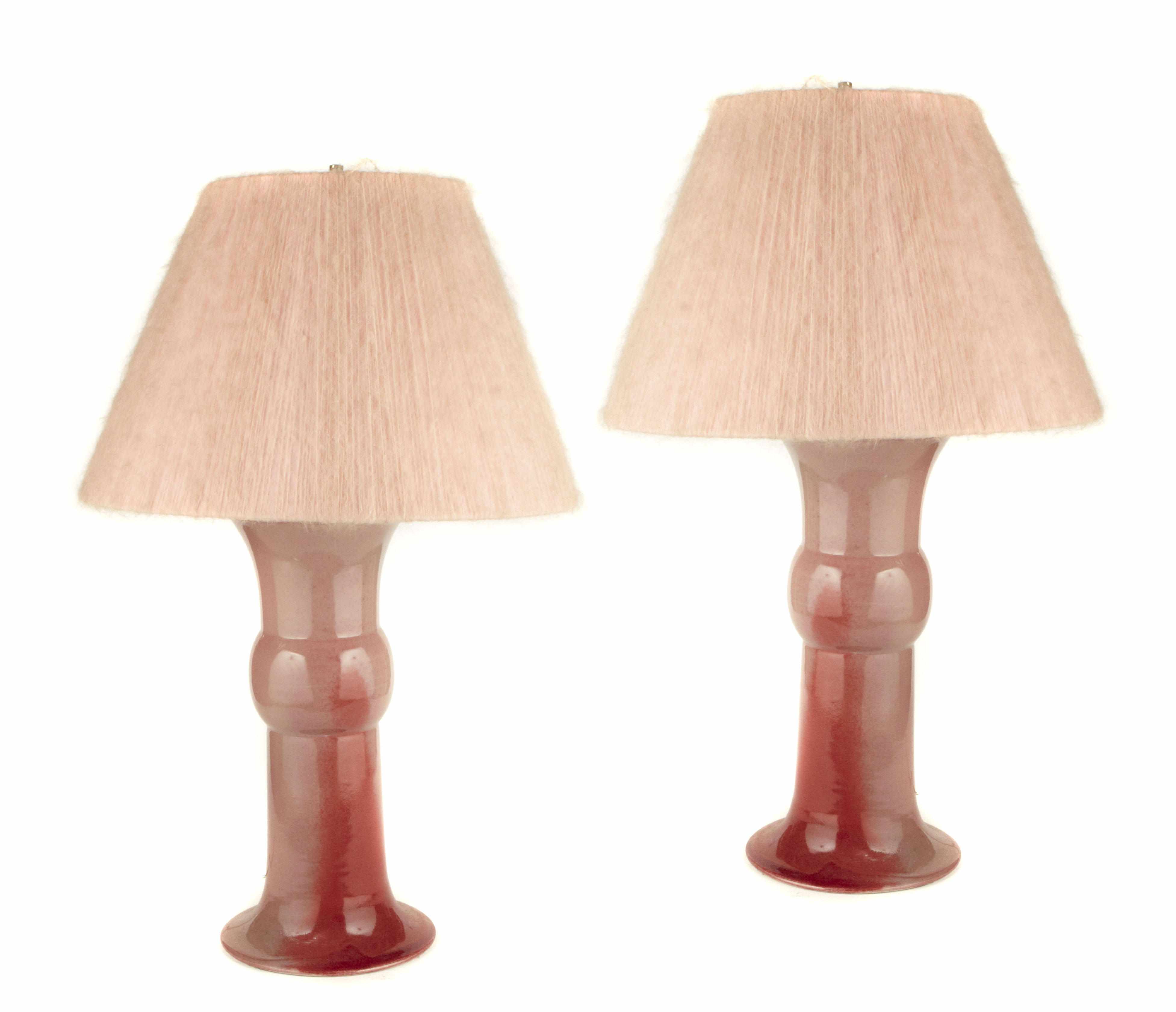 Appraisal: A pair of Chinese style flamb glazed gu form lamps