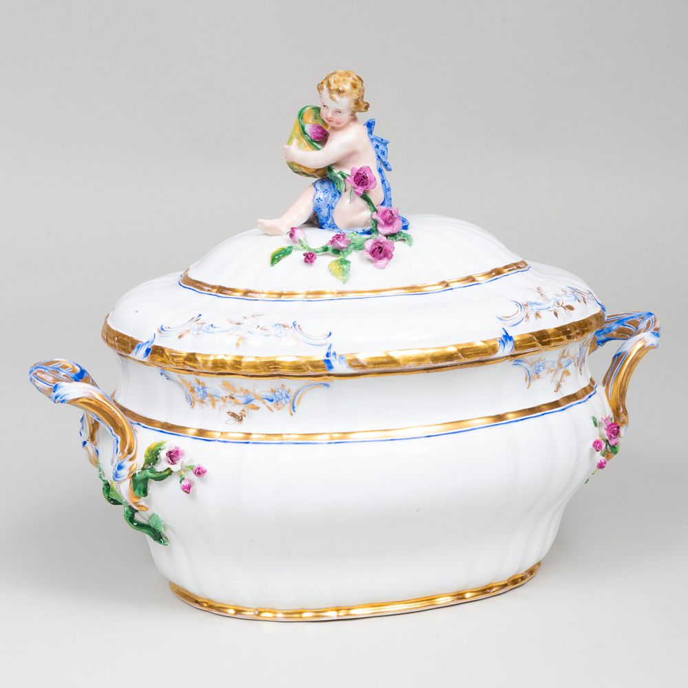 Appraisal: Berlin Porcelain Tureen and Cover with Putti Finial Blue scepter