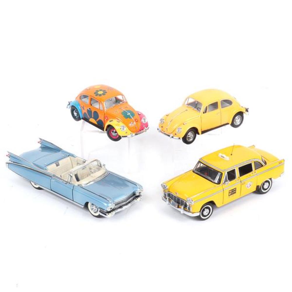 Appraisal: FOUR FRANKLIN MINT DIE CAST CARS VOLKSWAGEN BEETLE CHECKERED TAXI