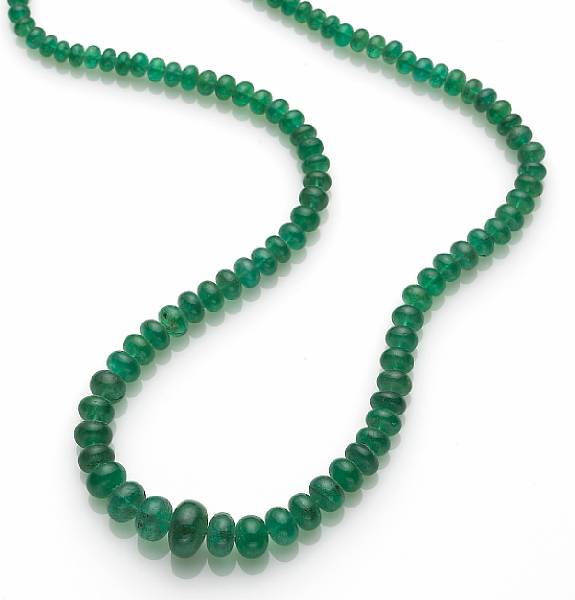 Appraisal: A graduated emerald rondelle bead and k gold necklace length